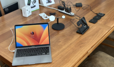 Multi-device charging dock on a desk setup in 2025