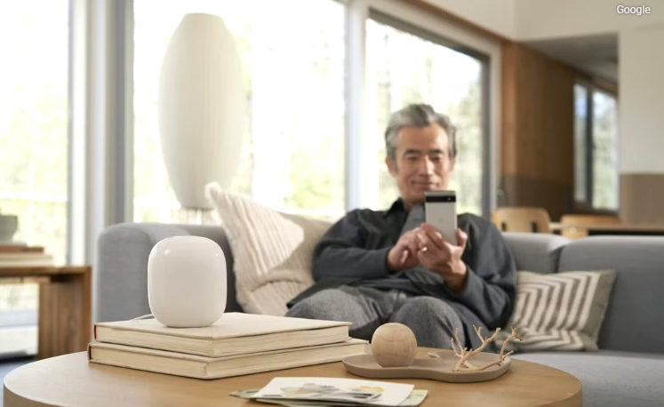 Google Home smart speaker in a modern living room setup