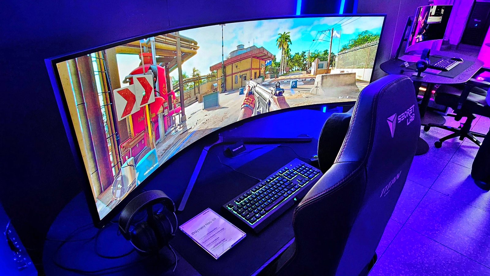 Futuristic gaming setup with multiple Samsung Odyssey monitors