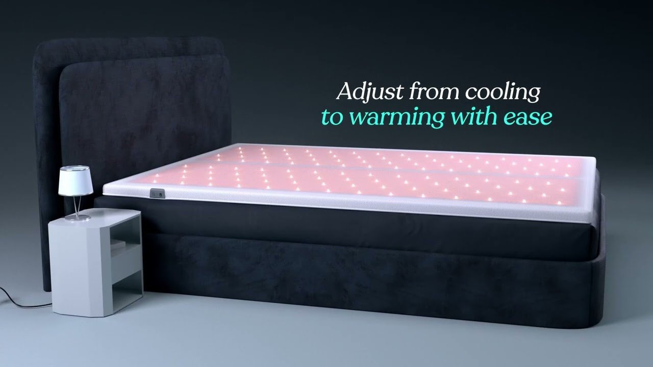 Cooling mattress pad on a bed for temperature-regulated sleep